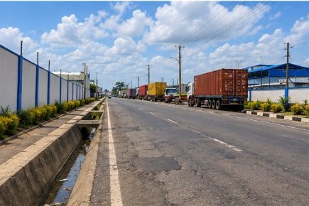 Container trucks queuing on the access road